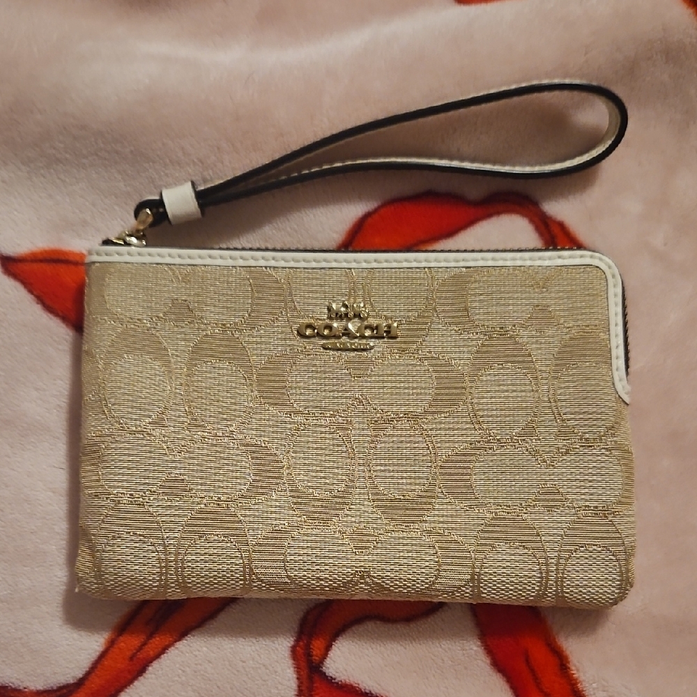 Coach Gold Wristlet with Signature Pattern